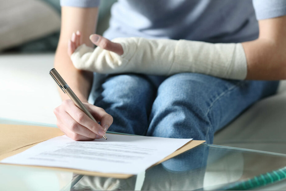 signing document while hand in cast